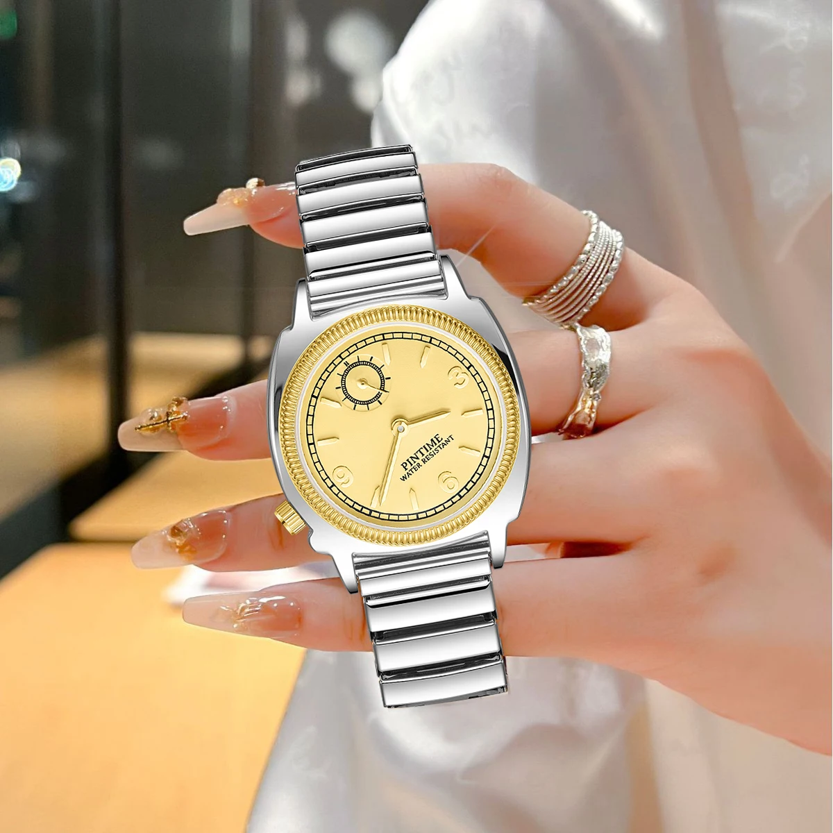 Elegant Women's Quartz Wristwatch with Spring Strap and Refined Design