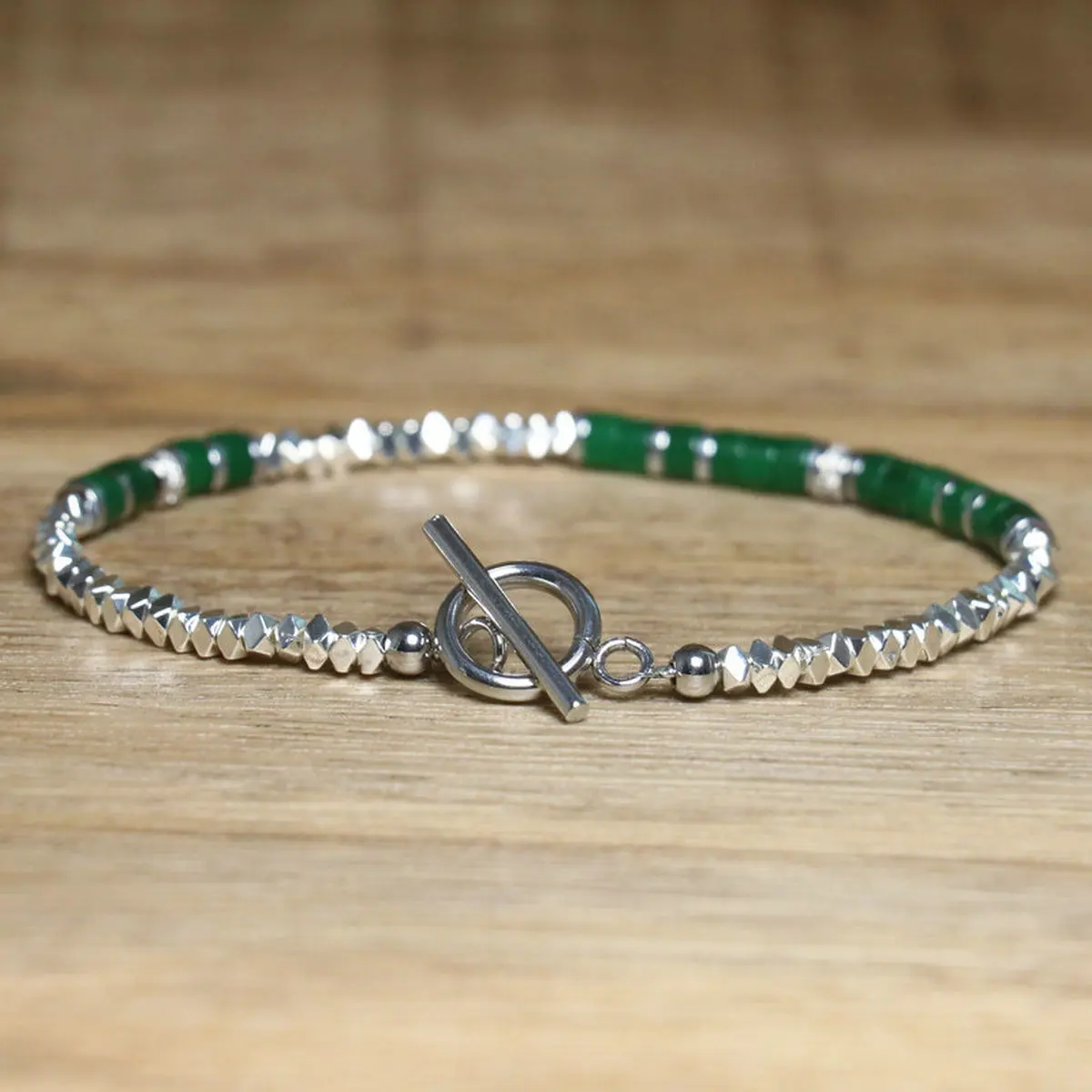 Bracelet perles rose pâle et hématite sur bois