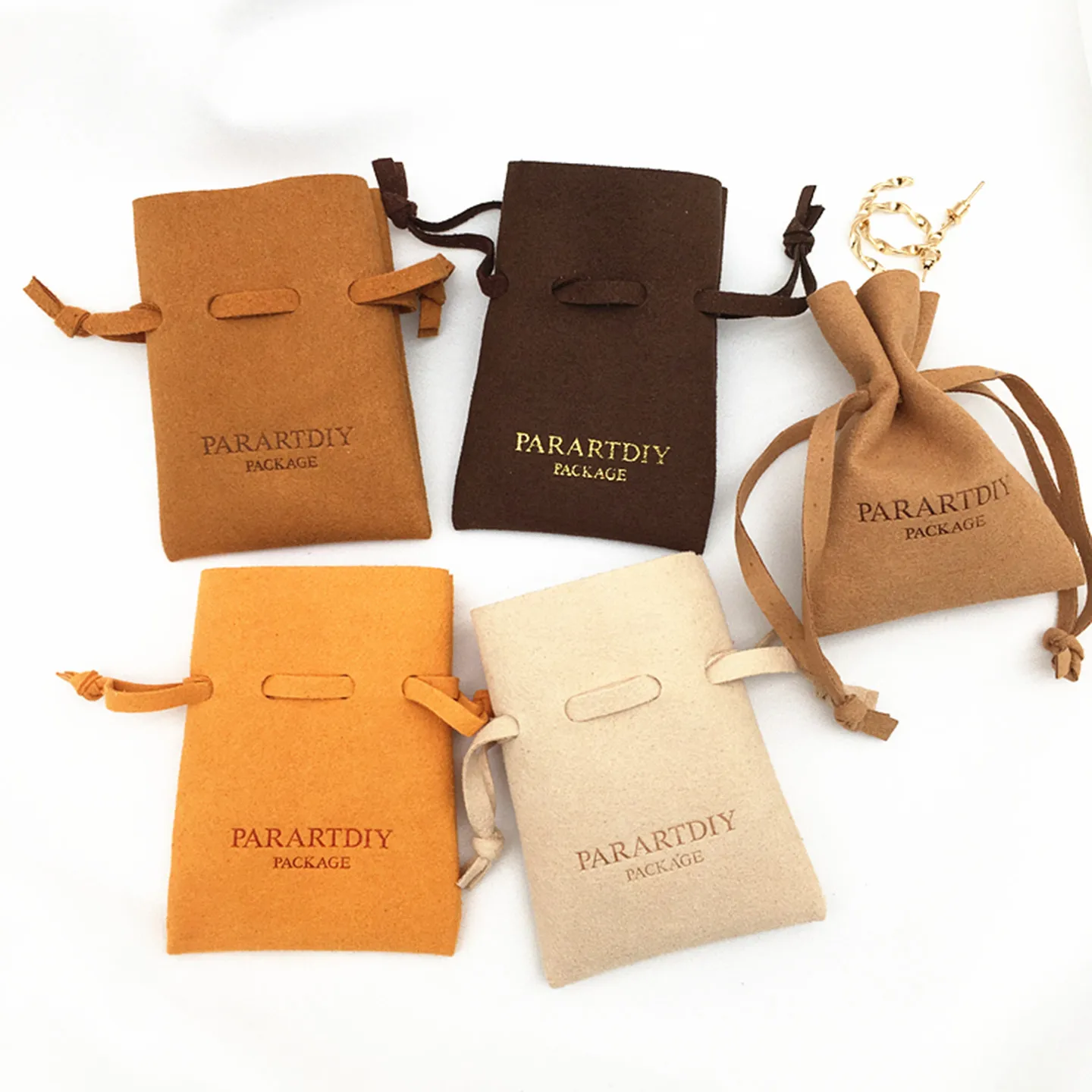 50 pieces of sand color personalized jewelry packaging bag drawstring can be customized logo fashion microfiber multi-color luck
