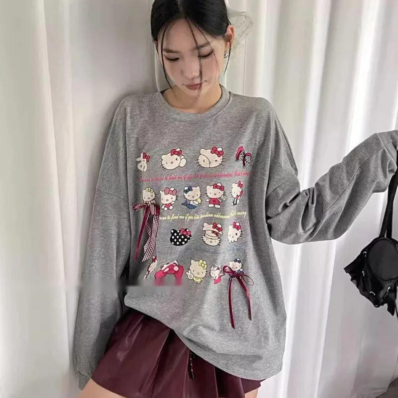 Camisetas nuevas de Sanrio Hello Kitty de algodón puro para primavera y otoño, versión coreana, con estampado de dibujos animados y lazo, informal, Y2k, para chica dulce, holgadas.