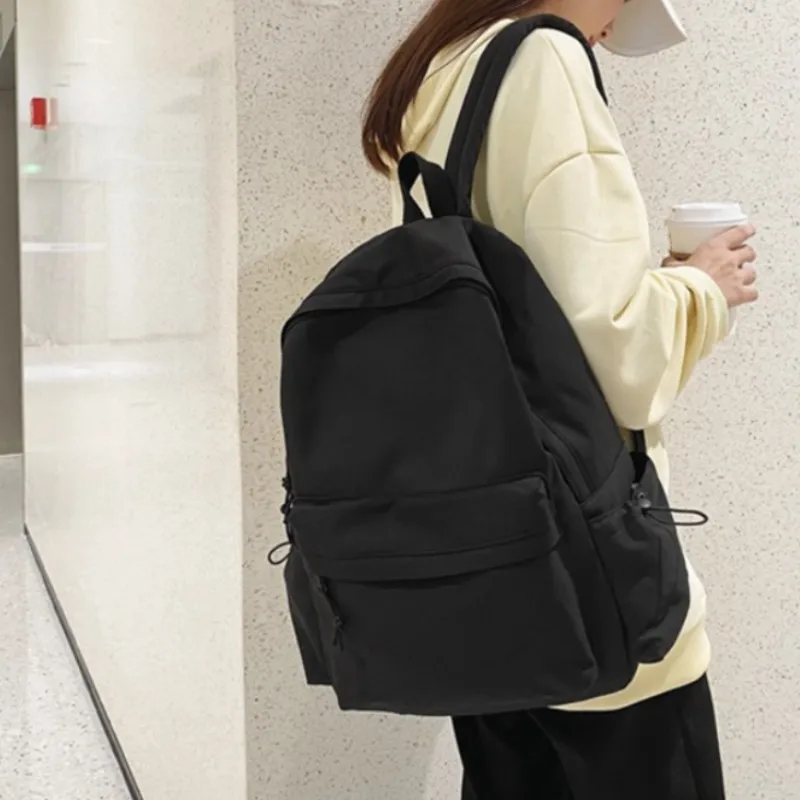 

1Pcs Black Backpack Solid Color Large Capacity Teenage Student Schoolbag Simple Leisure Canvas College Students Shoulder Bag