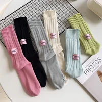 Unisex socks for men women Autumn and Winter ins style Solid color Medium tube cotton socks Sizes 36-44 3
