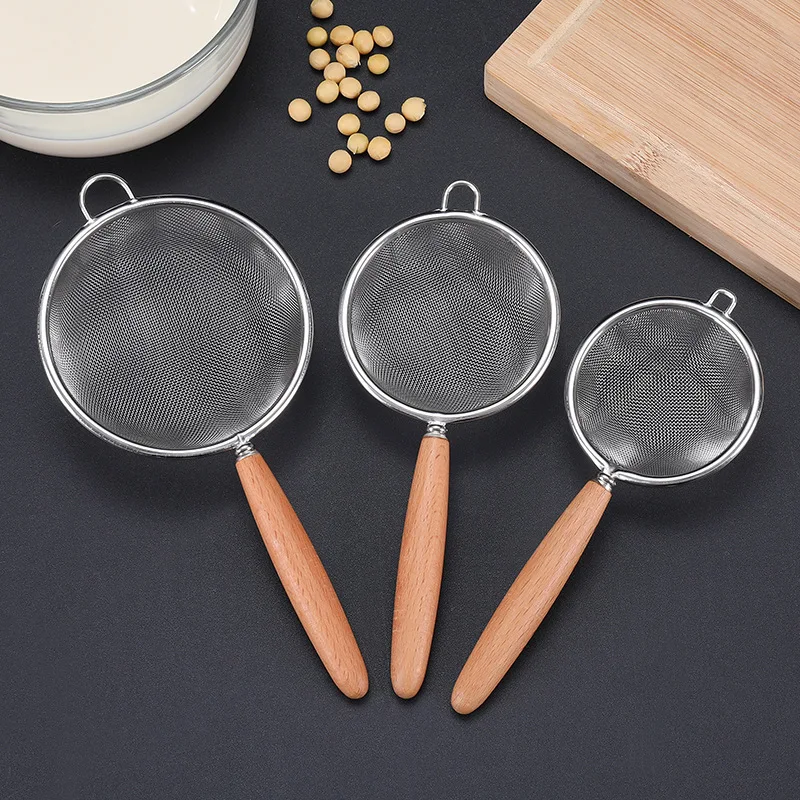 https://ae01.alicdn.com/kf/S9f63fb69fdc44746bfc6d4355361a701N/Extra-Large-Kitchen-Strainer-Skimmer-with-Sturdy-Wood-Handle-304-Stainless-Steel-Slotted-Spoon-Colander-Kitchen.jpg