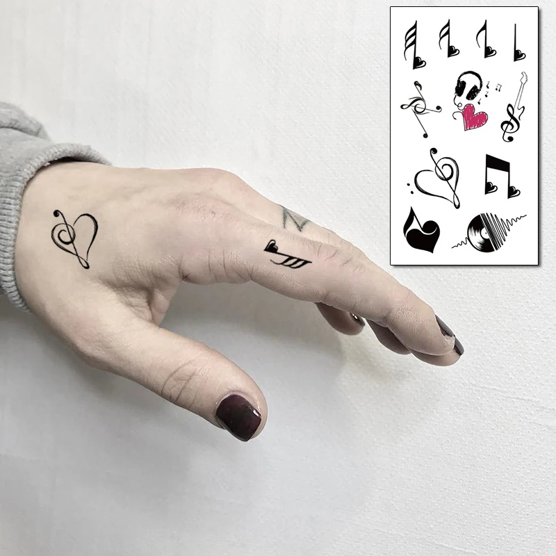 Music Note Tattoo Hand