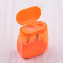 1pc Transparent Dual-Hole Geometric Manual Pencil Sharpener (Orange)