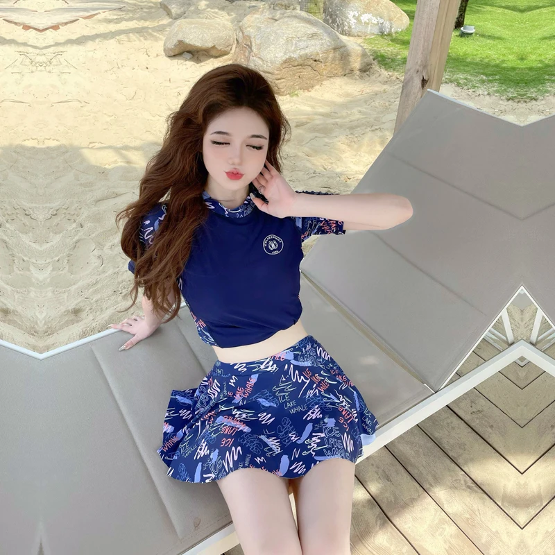 

Купальник из двух предметов, новинка 2023, Женская юбка, стиль, консервативный спортивный купальник, купальный костюм с коротким рукавом, Рашгард, гидрокостюм