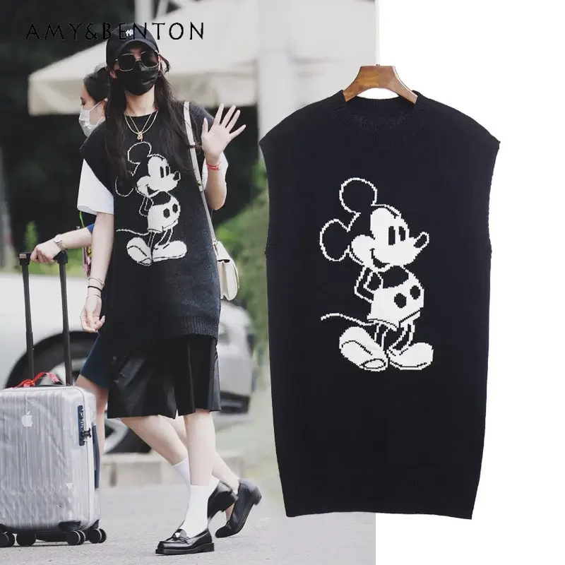 

Свитер женский трикотажный средней длины, без рукавов