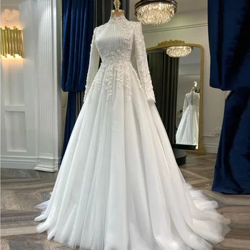 Elegante abito da sposa musulmano per la sposa con applicazioni di fiori arabo Dubai maniche lunghe abito da sposa in tulle Robe De Mariage