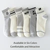 5-Pair Men's Four Seasons Striped Alphabet Slogan Grid Fashion Sports Academy Style Sweat Absorbing Breathable Middle Socks 2