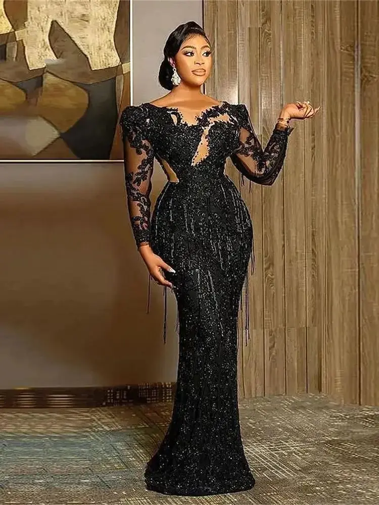 

Sexy Black Evening Dresses Jewel Neck Illusion Lace Appliques Crystal Beaded Party Dress Mermaid Long Sleeves Formal Prom Gowns