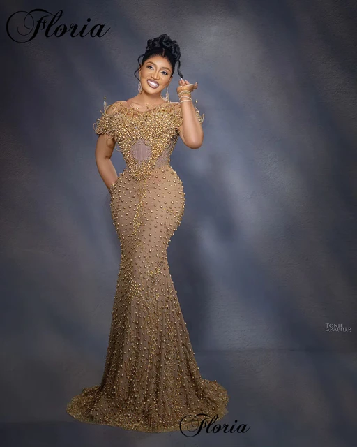cassie gold dress shoulder bow detail that exudes modern elegance and effortless charm Cassie Rose Gold Gown –