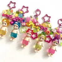 ⁦ميدالية مفاتيح Y2K Angel Baby Candy Shop يدوية | تعليقة حقيبة مطرزة بلطافة عالية، إكسسوار جمالي ناعم وساحر لحقائب الظهر بأسلوب كيوت ومميز 🎀✨.⁩ - الصورة ⁦2⁩