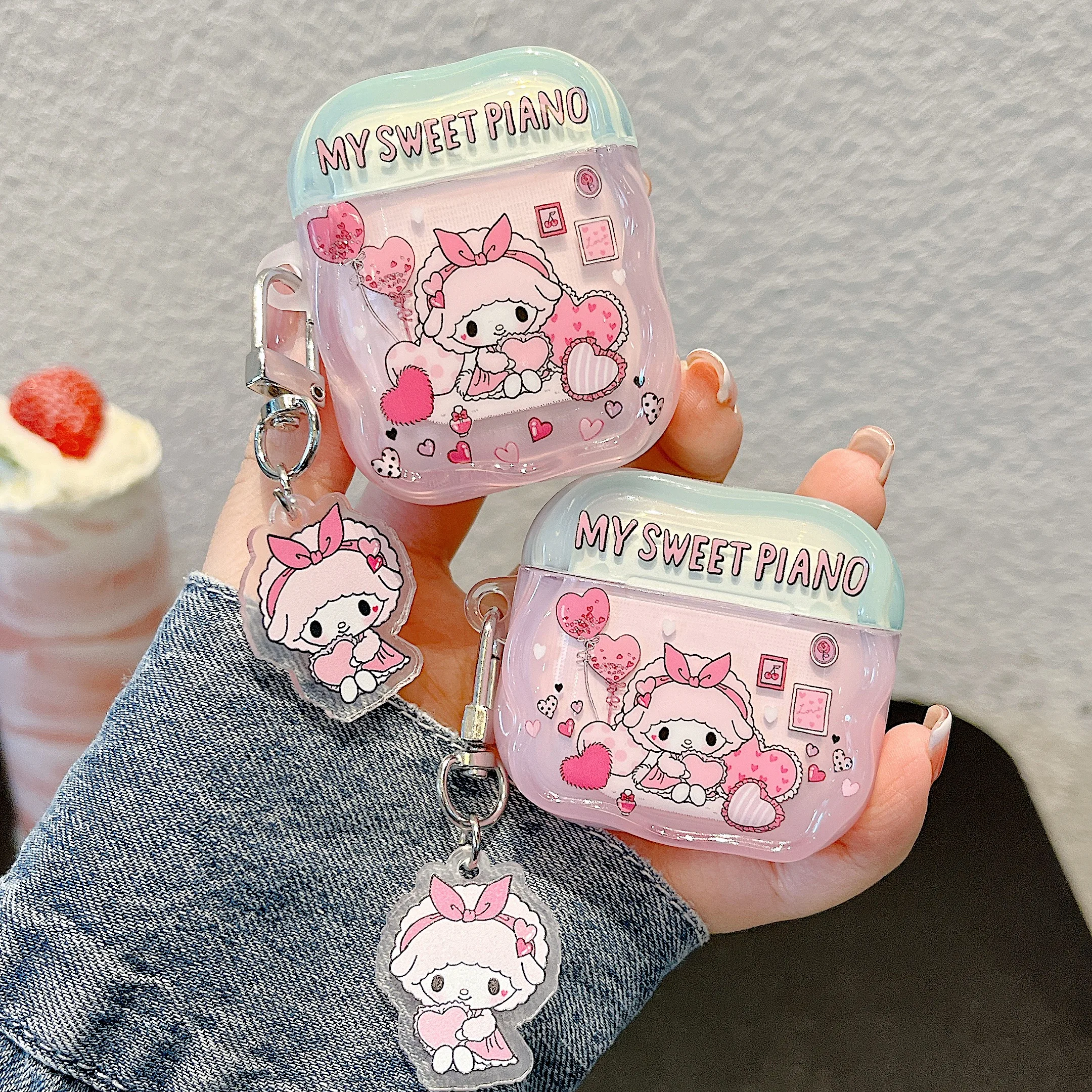 Charming Glossy TPU Earphone Case with Pendant - HelloKitty, MySweetPiano & Gudetama Design