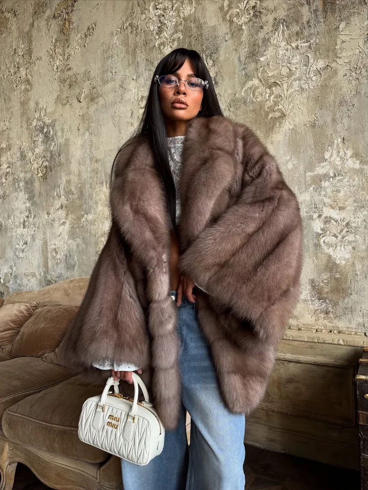 Femmes élégant fausse fourrure manteau cloche manches revers daim Surface ceinture manteaux Unique luxe tempérament 2025 nouvel hiver haute rue