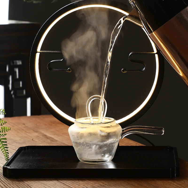 https://ae01.alicdn.com/kf/S9fe647f55dbf4023aa415d19e3fc1a8dP/Heat-resistant-glass-tea-set-magnetic-water-diversion-rotating-cover-bowl-semi-automatic-tea-maker-lazy.jpg