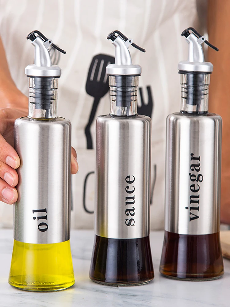 https://ae01.alicdn.com/kf/S9fe7e530bbba4928b005092aa15dd0255/Superior-Glass-Oil-and-Vinegar-Dispenser-2Pcs-Modern-Olive-Oil-Dispenser-Clear-Glass-Oil-Bottle-Pouring.jpg