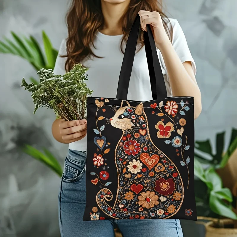 유니크한 디자인과 넉넉한 수납 공간의 꽃 검은 고양이 토트백