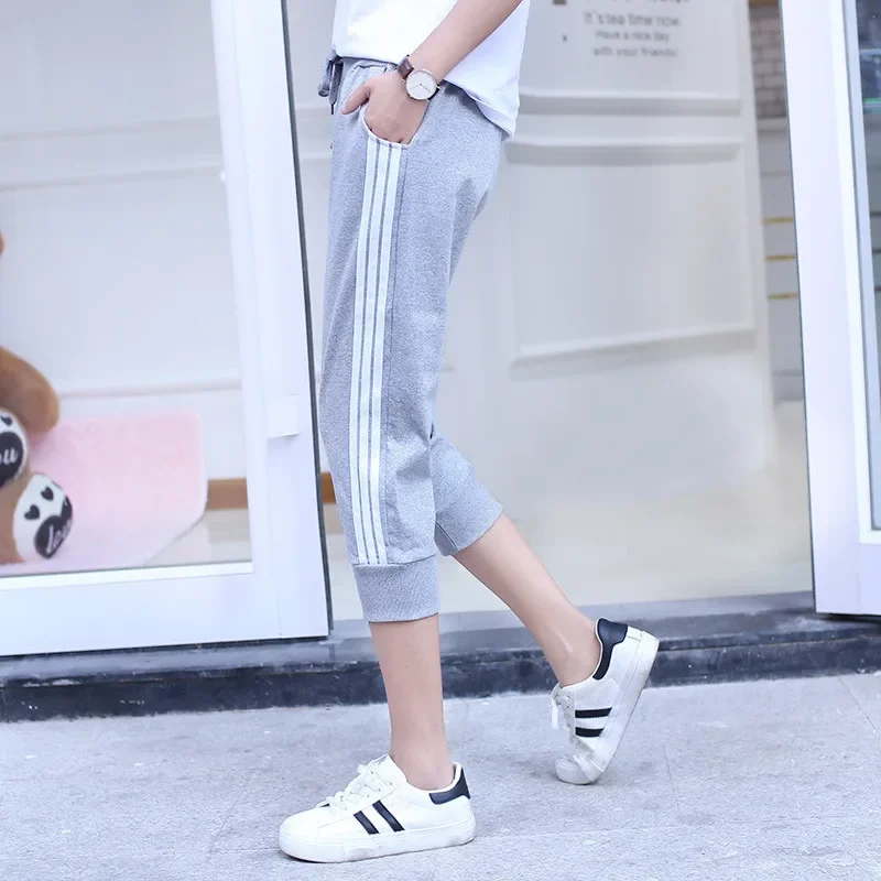 Casual Women's Running Fitness Tracksuit Pants White Horse Lift Bar Seven Point Pants Sporty Trendy Outerwear Fitness Wear