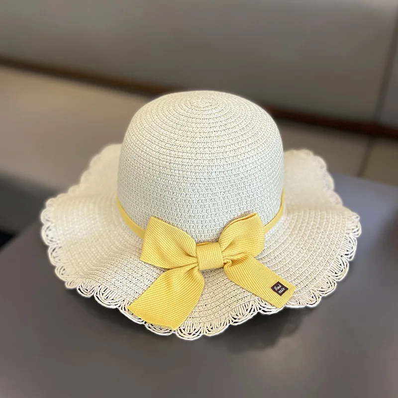 Ruffled beige hat