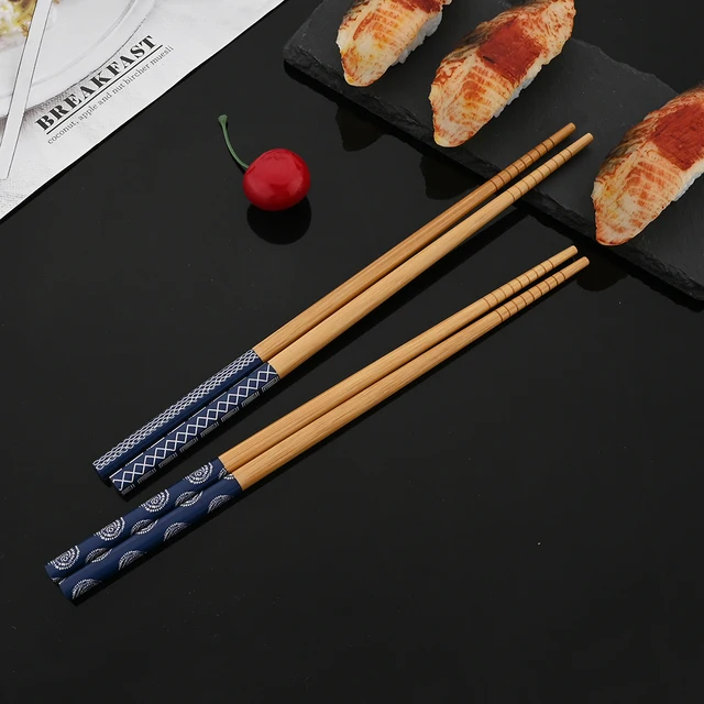 Palillos japoneses reutilizables, palillos de madera negra Natural, flor de  cerezo, juego de palitos para Sushi, comida china, 5 pares - AliExpress