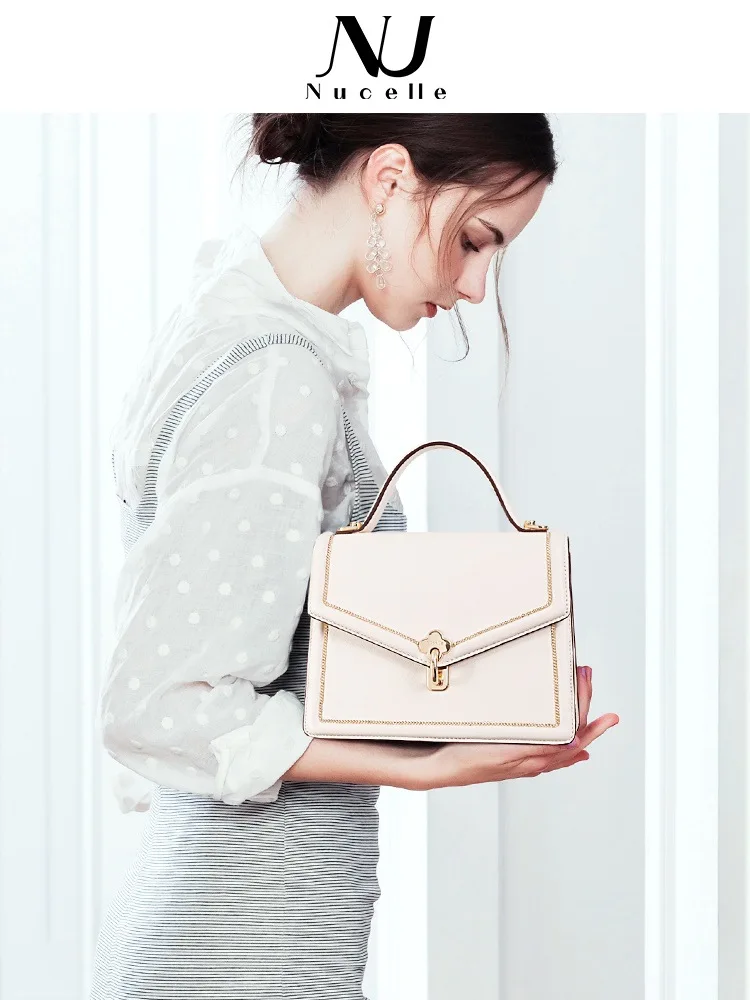 

NUCELLE Bag girl 2022 new fashion shoulder messenger bag advanced texture white simple Joker small handbag