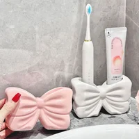 Creative Ceramic Bow Toothbrush Holder Ornament Ceramic Toothbrush Toothpaste Storage Rack Bathroom Accessories Brush Holder 2