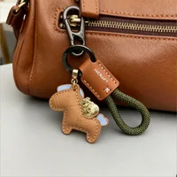 Porte-clés de voiture en cuir véritable, minimaliste, avec sangle Premium, Durable, pour hommes et femmes, cadeau de Couple, 1 pièce 6