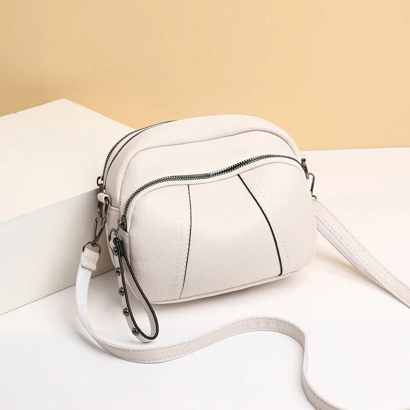 Solid Color Fashionable Rivet Zipper Women's Mobile Phone Bag