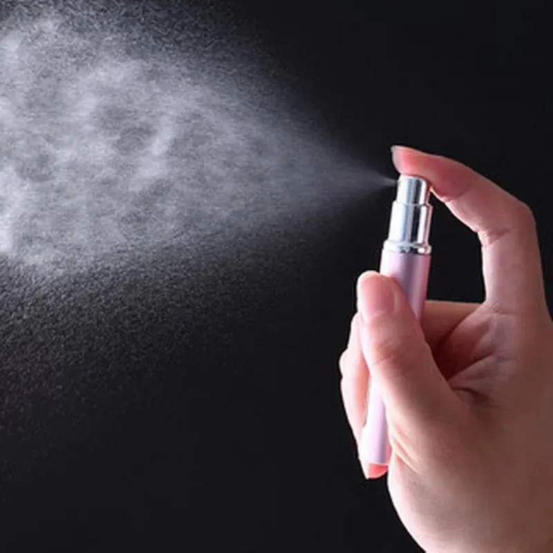 PORTABLE REFILLABLE PERFUME BOTTLE - Ultra-fine Spray Bottle with 0.17 Oz. Capacity for On-the-go Perfume Use. 5