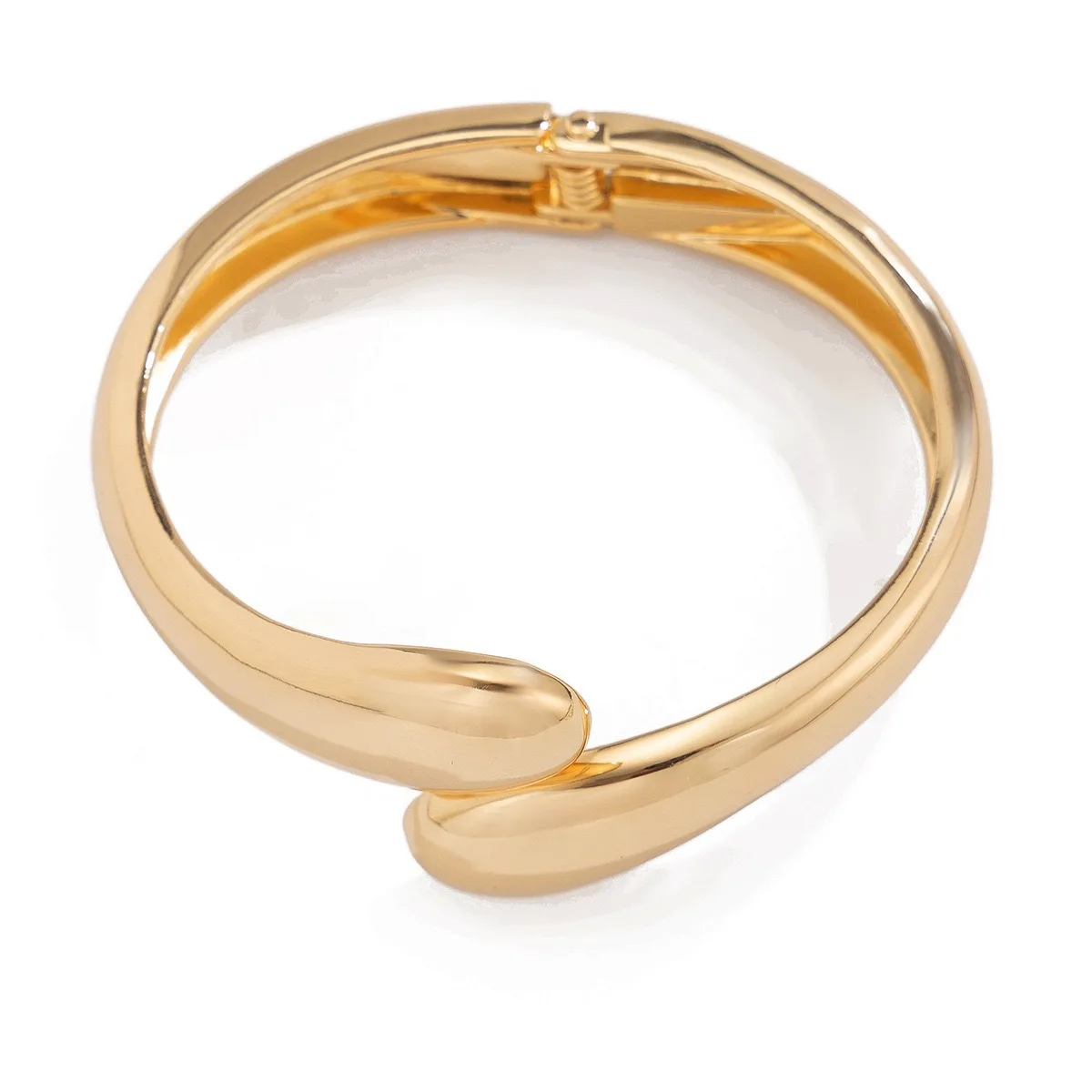 Gold-tone cuff bracelet with pearl ends for women – wide statement bangle with modern fashion appeal.