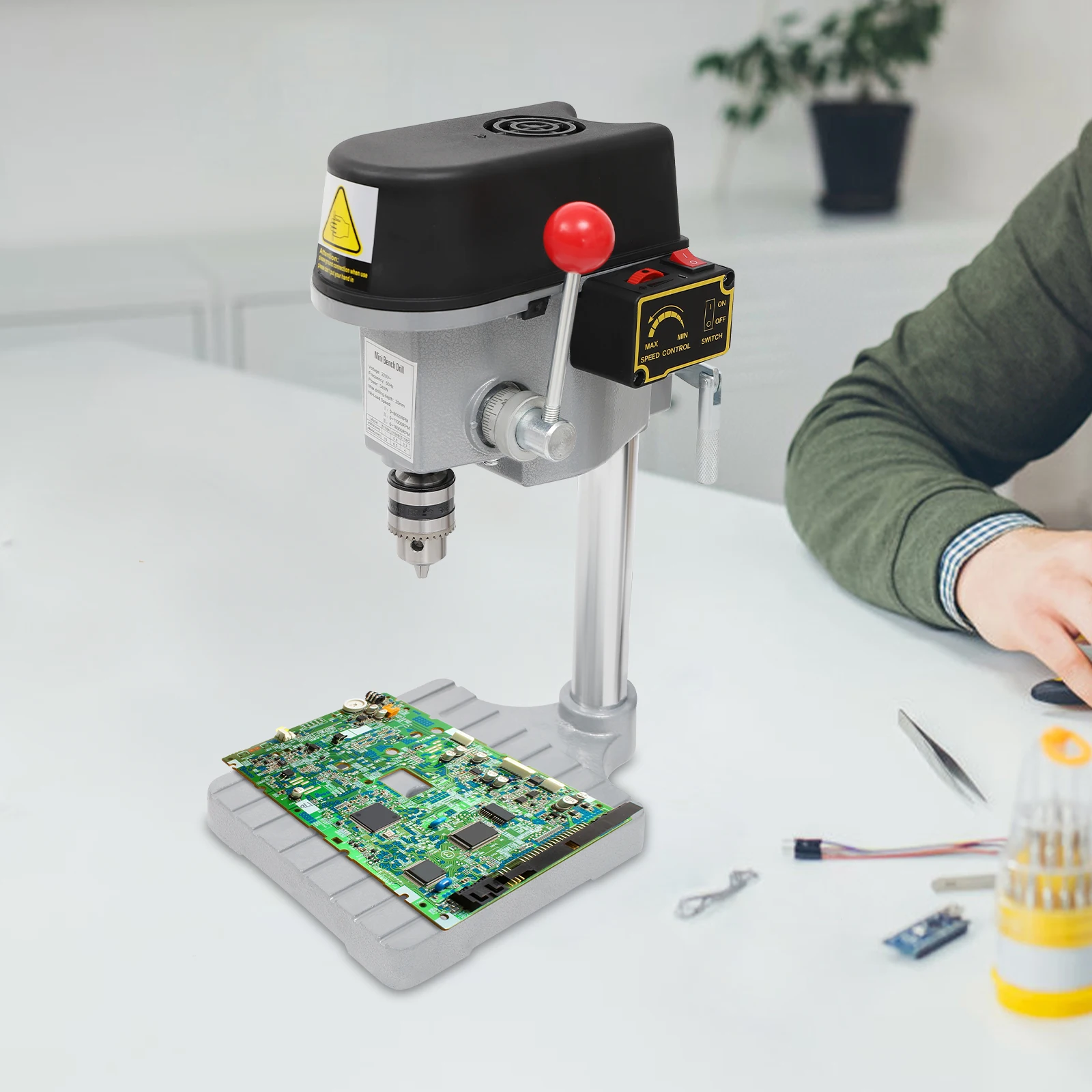 Speed adjustment knob on the drill press