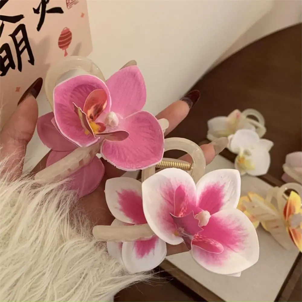 

Заколка для волос с орхидеей и бабочкой