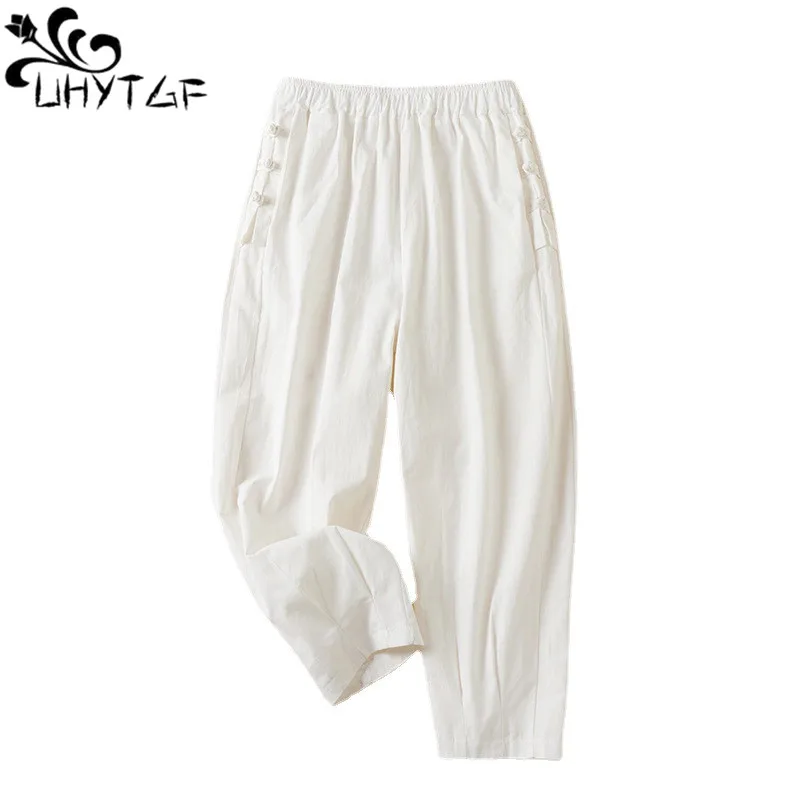 

UHYTGF New Disc Buckle Cotton Linen Pants Women Elastic Waist Haren Trousers Female Stitching Foot Nine Points Casual Pants 2179