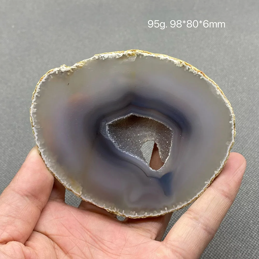 Natural agate slice polished ore specimen with crystal hole