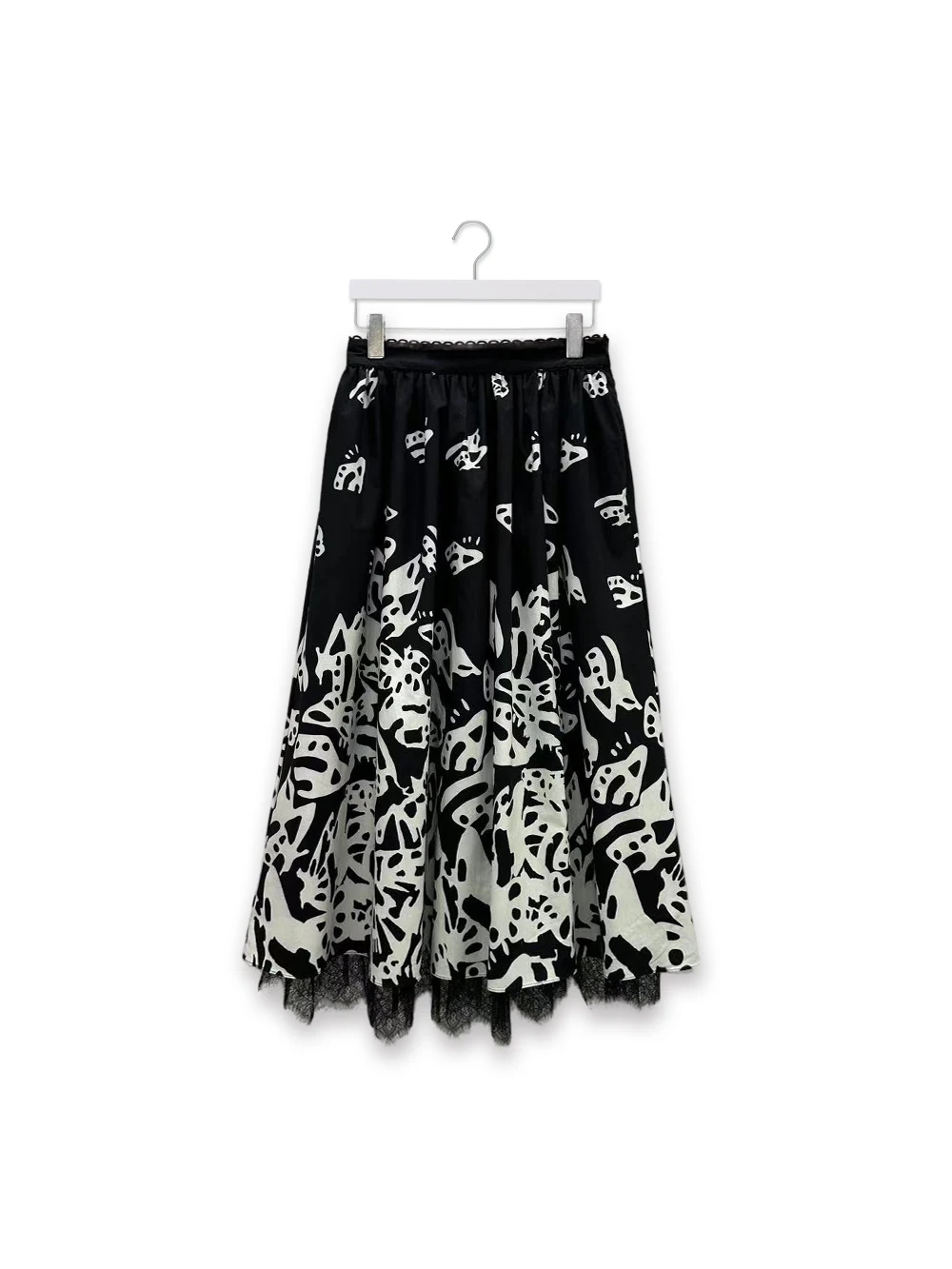 

Long cotton skirt for women, floral printed skirt with elastic waist, loose fit, with extended hem in black and white color