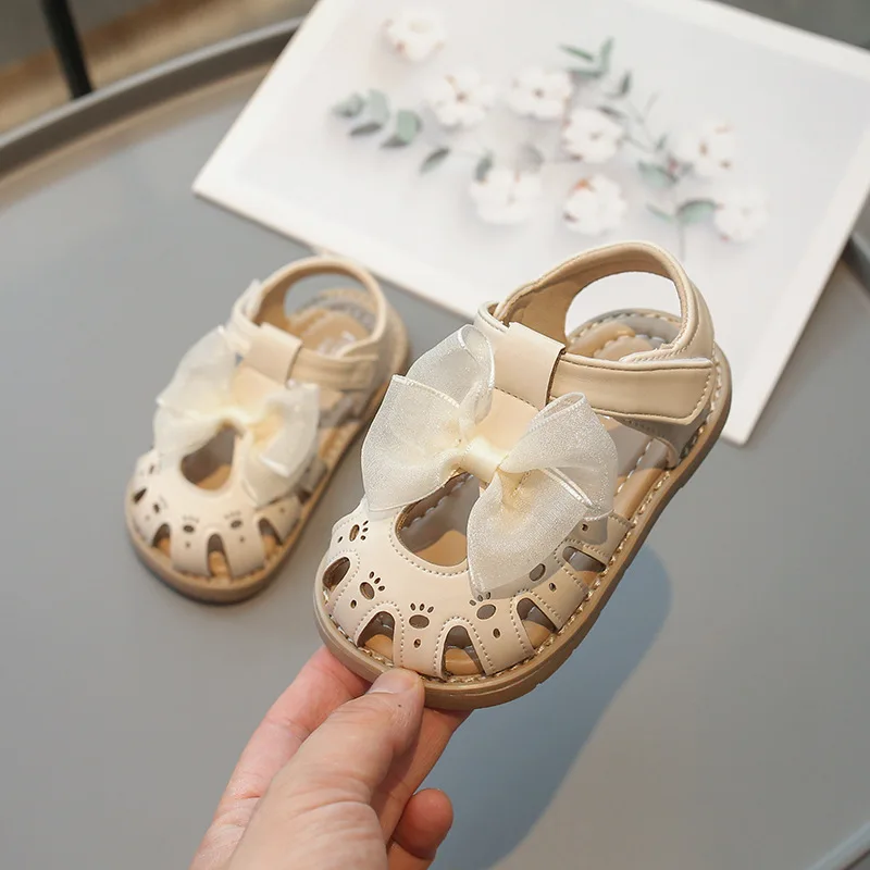 

Toddler Girls Sandals 2024 Summer Kids Princess Sweet Bowtie Flat Sandals Fashion New Children's Causal Cut-outs Dress Sandals
