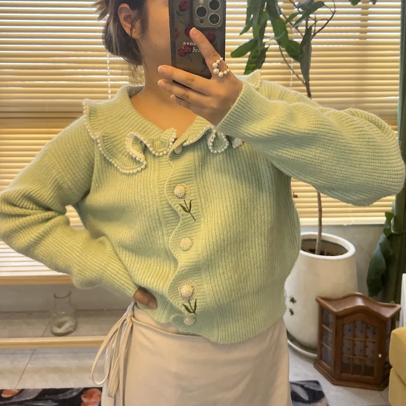 

Autumn And Winter 2022 New Fungus Edge Pearl Sweater Women's Cardigan Baby Collar Sweet Knitted Top Trend