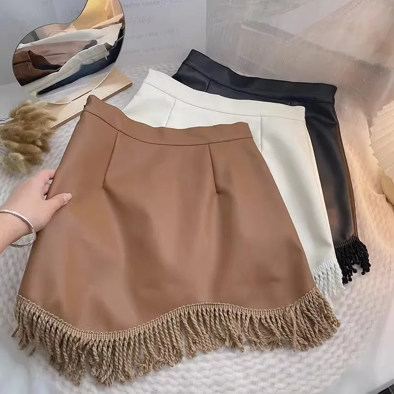 

women skirt High waist package hip tassel irregular pu leather skirt fringed retro short skirt for women