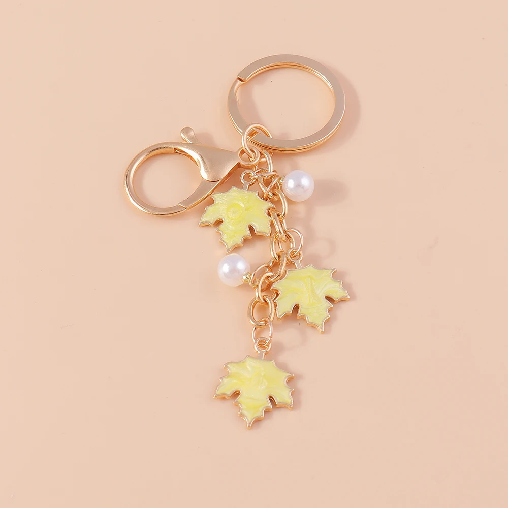 

Pretty Enamel Pearl Maple leaves Keychain Plant Keyring Pendants for Women Girl Handbag Decor Charms DIY Jewelry Gifts