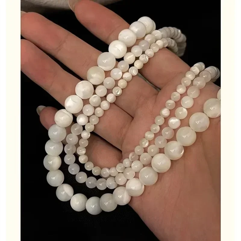 Minar Elegant Natural Shell Beaded Necklace with Silver-Plated Chain