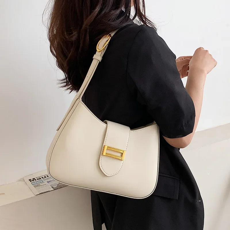 

Women's 2024 New Autumn and Winter Crowd Design Dumpling Commuter Shoulder Bag Underarm with Unique Storage Features