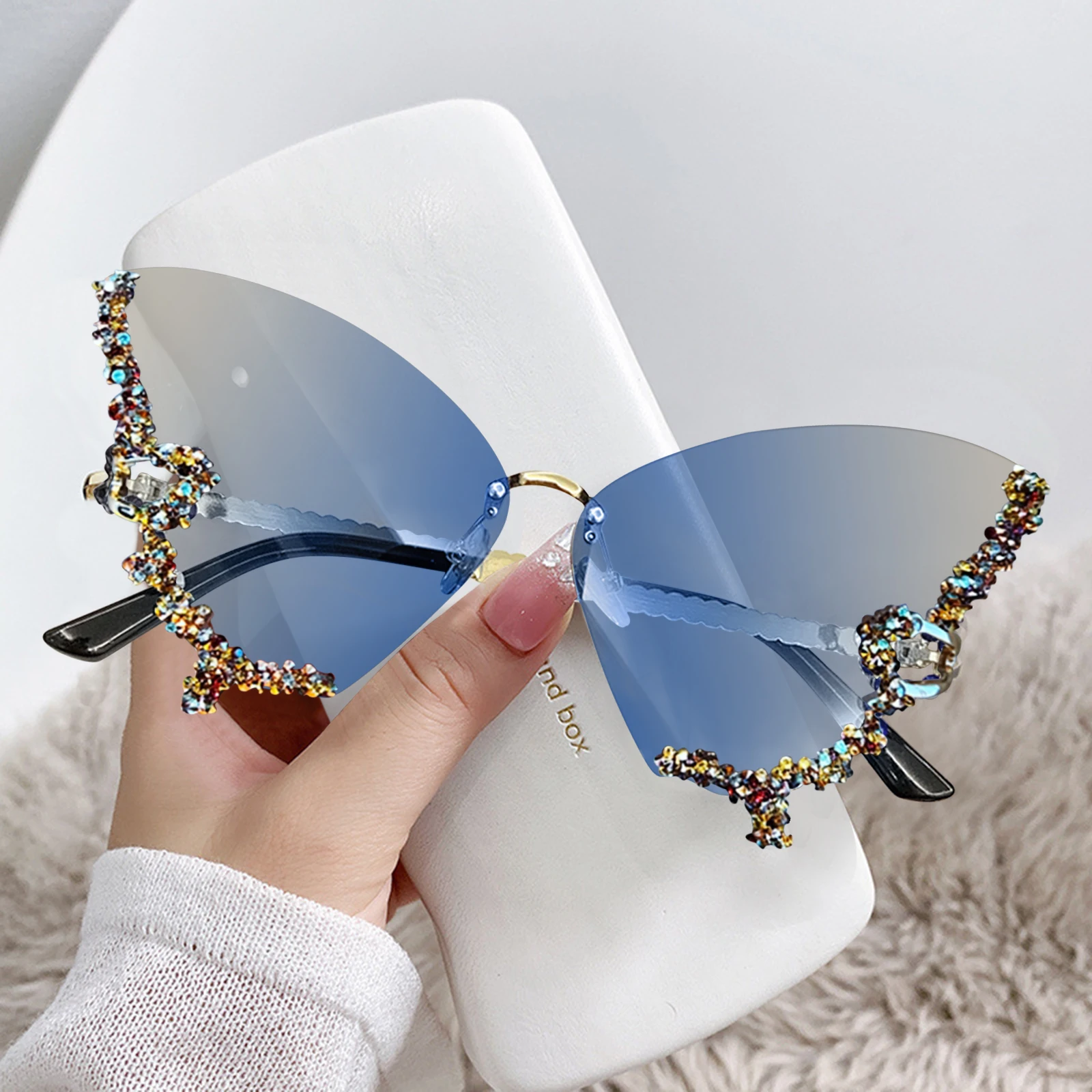 Vlinder zonnebril voor dames met strass en uv-bescherming_voghion.com