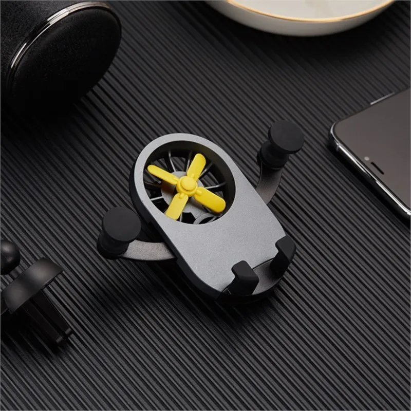 

New Universal Gravity Mobile Phone Holder Lazy Multifunctional Car Air Outlet Car Aromatherapy Portable High-end Design Holder