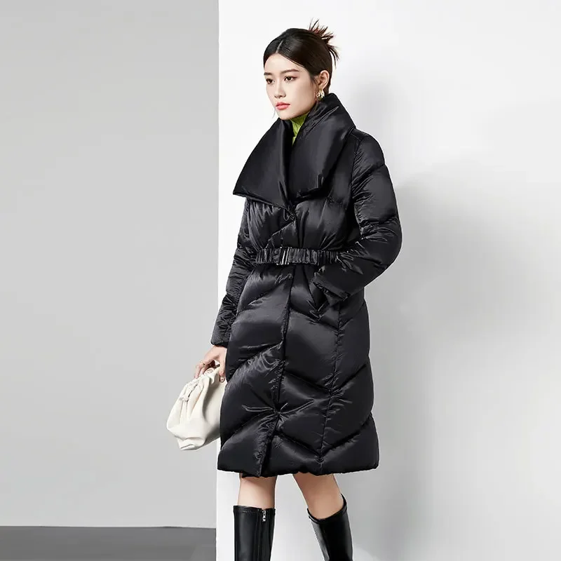 Down jacket long solid color loose waist thick warm lapels high-end fashion glossy white duck down ladies coat.