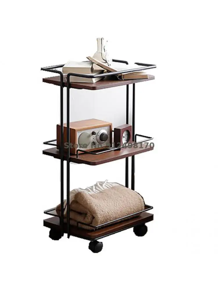 A few corners on the side of a Japanese sofa, a movable iron dining car, multi-layer rack, kitchen storage rack, living