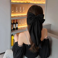 Elegant Red Satin Bow Hair Clip - Fashionable Hair Accessory (Black)