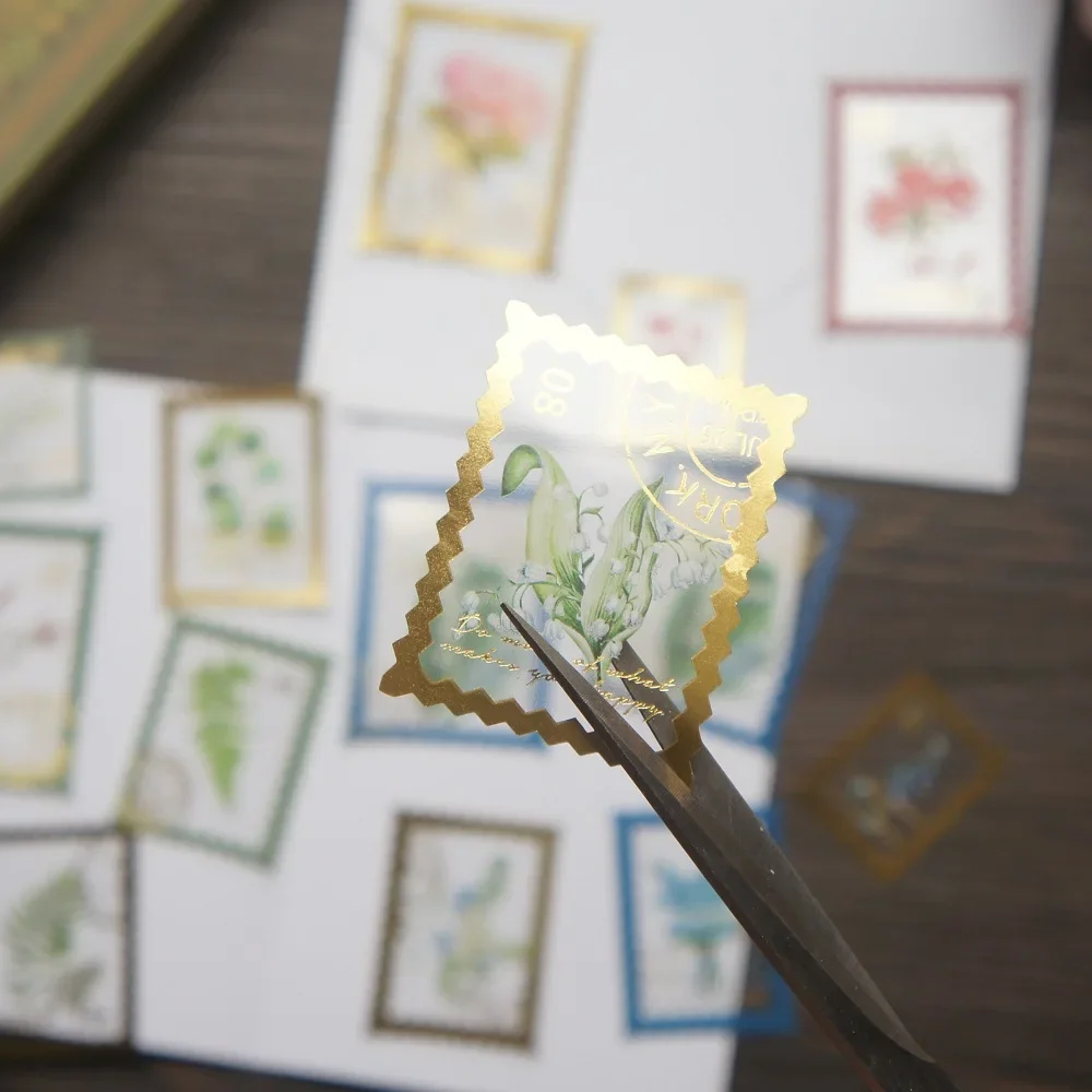 

28pcs Gold Stamp Frame Lily of The Valley Plant Style PVC Sticker Scrapbooking Background DIY Gift Packing Label Decoration Tag