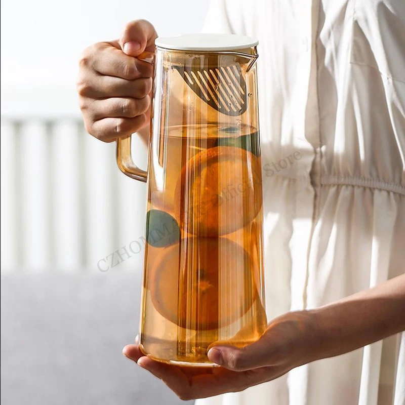 https://ae01.alicdn.com/kf/Sa193b80f8cdf463aa0c2e7cb78cf17722/1-8L-Glass-Water-Pitcher-with-Handle-Heat-Resisttant-Cold-Hot-Kettle-Large-capacity-Tea-Pot.jpg