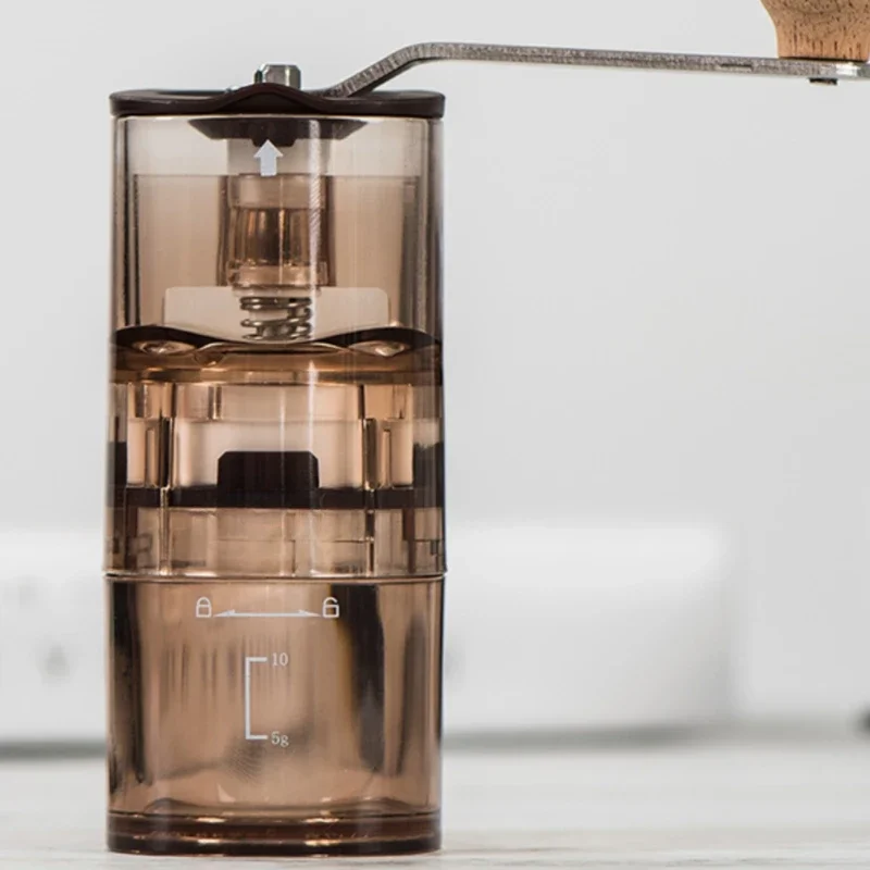 

Hand-cranked coffee grinder transparent grinder hand-grinded coffee machine home mini set mini grinder.