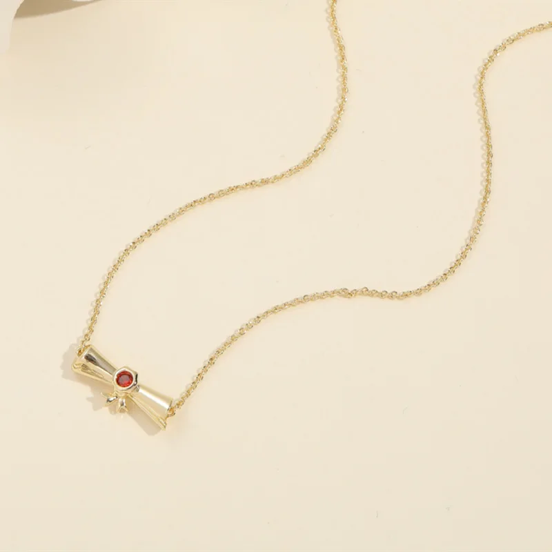

2022 New Fashion Women Elegant 14K Gold Ruby Inlaid Scroll Pendant Copper Chain Necklace Students Graduation Season Gifts